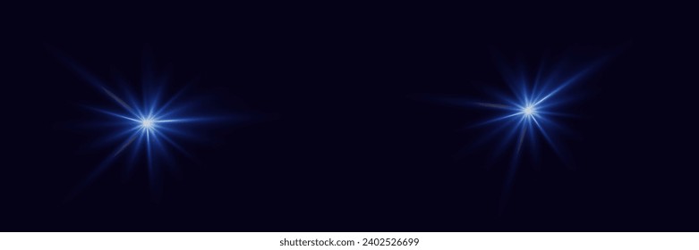A flash of light and the sparkle of stars. Light of lights and glare. On a dark background.