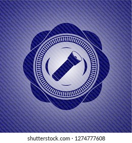 flashlight icon inside badge with denim texture