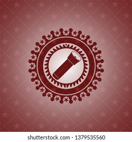 flashlight icon inside badge with red background