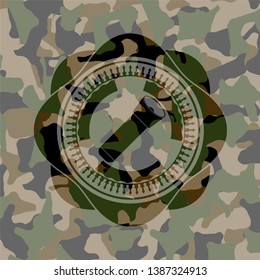 flashlight icon inside camouflage emblem