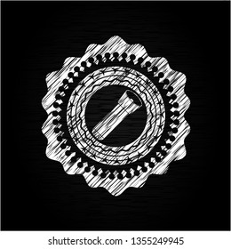 flashlight icon inside chalkboard emblem
