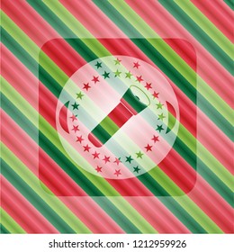 flashlight icon inside christmas badge.