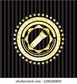 flashlight icon inside gold emblem