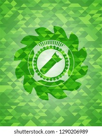 flashlight icon inside green emblem. Mosaic background