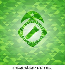 flashlight icon inside green emblem with mosaic background