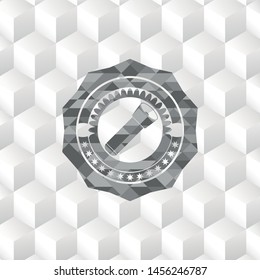 flashlight icon inside grey badge with geometric cube white background