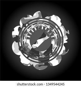 flashlight icon inside grey camouflage texture