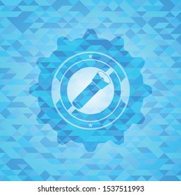 flashlight icon inside light blue emblem. Mosaic background