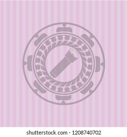 flashlight icon inside pink emblem