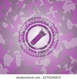 flashlight icon inside pink and purple camo texture. 