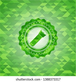 flashlight icon inside realistic green emblem. Mosaic background