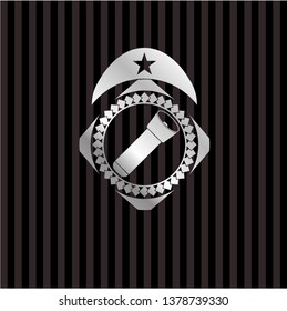 flashlight icon inside silver badge