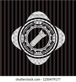 flashlight icon inside silvery emblem