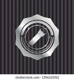 flashlight icon inside silvery shiny badge