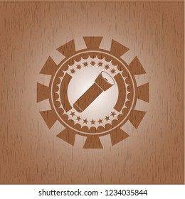 flashlight icon inside vintage wood emblem
