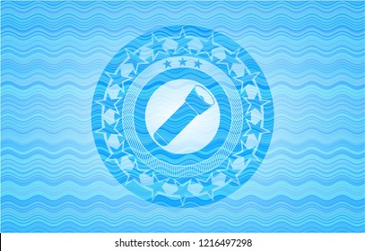 flashlight icon inside water concept style badge.