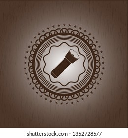 flashlight icon inside wood emblem. Vintage.