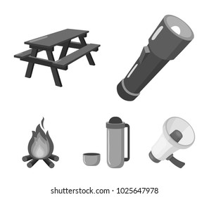 A flashlight, a table with a bench, a thermos with a cup, a caster. Camping set collection icons in monochrome style vector symbol stock illustration web.