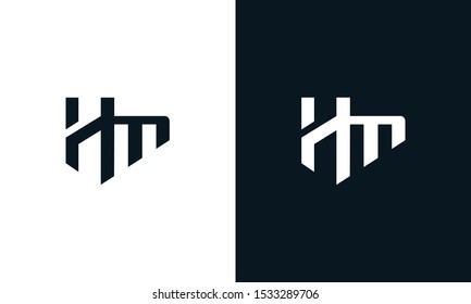 Flat abstract letter HM logo. This logo icon incorporate with two abstract shape in the creative process.
