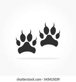 flat black animal footprints with drop shadow, lion or tiger feet mark