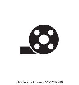 flat black glyph film reel icon. Logo element illustration. film reel design. vector eps 10 . film reel concept. Can be used in web and mobile . 