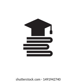 flat black glyph graduation cap with book icon. Logo element illustration. university design. vector eps 10 . academic educate concept. Can be used in web and mobile . 
