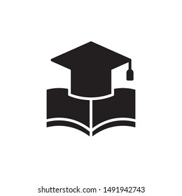 flat black glyph graduation cap with book icon. Logo element illustration. university design. vector eps 10 . academic educate concept. Can be used in web and mobile . 