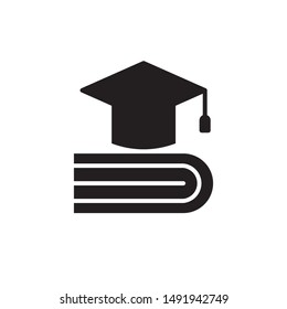 flat black glyph graduation cap with book icon. Logo element illustration. university design. vector eps 10 . academic educate concept. Can be used in web and mobile . 