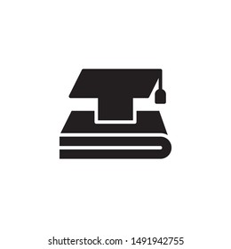 flat black glyph graduation cap with book icon. Logo element illustration. university design. vector eps 10 . academic educate concept. Can be used in web and mobile . 