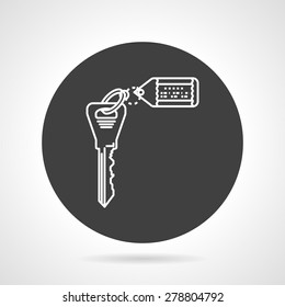 Flat black round vector icon with white line key with label for real estate on gray background. 