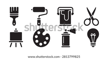 Flat black silhouette art supplies collection including painting equipment symbols for creative design work.