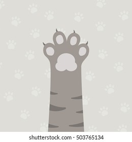 flat brown cat's leg with gray paw and gray paws pattern background