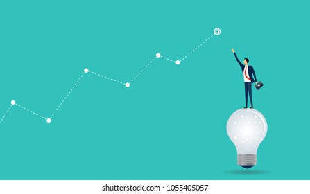 flat businessman standing on light bulb with business finance graph concept