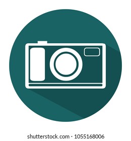 Flat camera icon. White line design in dark green round background with shadow.