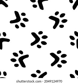 Flat cartoon animal footprint silhouette seamless pattern. Cat or dog foot, unknown animal. Black print paw trace. Vector illustration. Trendy style design.