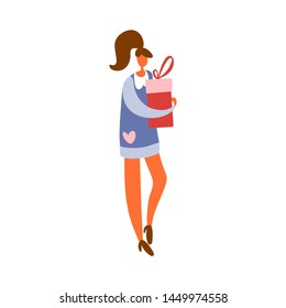 Flat cartoon girl or woman standing and holding gift box with bow preparing for celebration. Vector illustration.