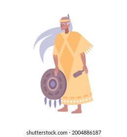 Flat character of smiling elderly indian shaman in traditional costume holding tambourine vector illustration