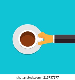 Flat coffee cup in hand.