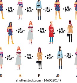 Flat colored seamless pattern with young women or girls dressed in fashionable clothes. Group of female friends, feminists. Girl power concept. Female cartoon characters. All elements are isolated