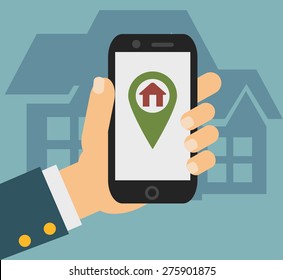 Flat concept - hand holding mobile phone with gps app on the screen - searching for a house