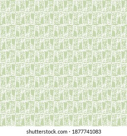 Flat decorative design, made of several patches and dots. Mosaic textile pattern, in light green and white. Wallpaper texture.