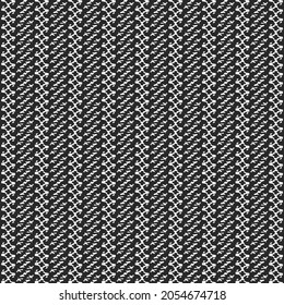Diseño plano en blanco y negro con rayas decorativas alternadas. Textura abstracta de bordado.