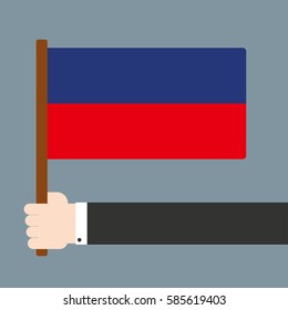 Flat design. Hand holding flag Lichtenstein
