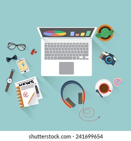 Flat design illustration of creative office workspace with computer. Top view of desk background with laptop, digital devices, books and documents.
