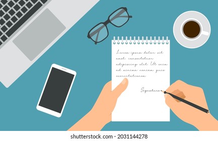 Flat design illustration of hand holding notebook and pencil writing notes. Work desk with laptop, glasses and cup of coffee - vector