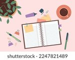 Flat design of open notebook on table with cup of coffee, books and stationary vector design