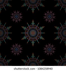 Flat design of pink and blue snowflakes isolated on black background. Snowflake seamless pattern. Vector snowflakes background. Snowflakes pattern.
