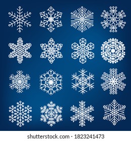 Diseño plano copos de nieve vectorial Navidad y conjunto de elementos de decoración de año nuevo.