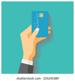 Flat design style illustration. Hand hold credit card to pay. Vector illustration, isolated on green