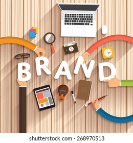 Flat design talking about digital marketing as text "Brand" Creative" on desktop.Vector Illustration